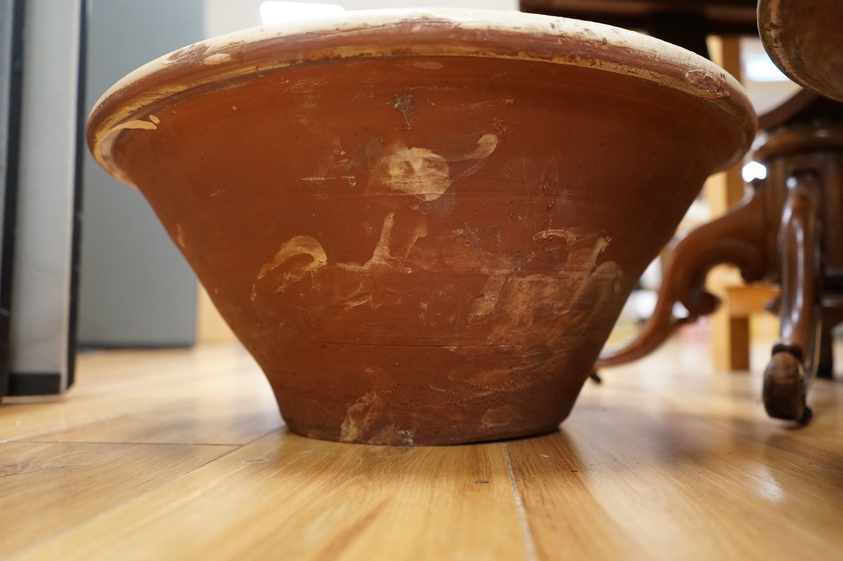 A pair of large slipware dairy bowls, 44cm diameter